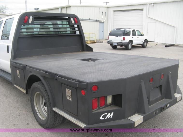 image for item H8646 2008 Ford F350 Super Duty XL Crew Cab flatbed truck