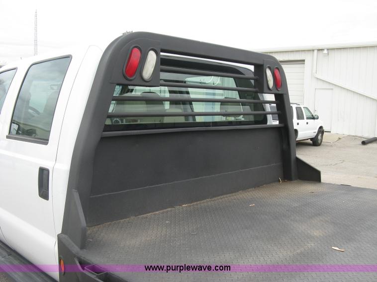 image for item H8646 2008 Ford F350 Super Duty XL Crew Cab flatbed truck