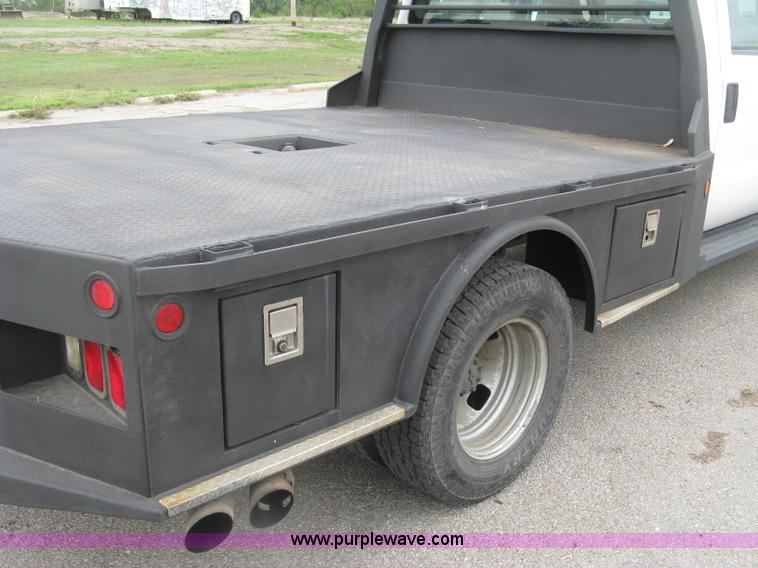 image for item H8646 2008 Ford F350 Super Duty XL Crew Cab flatbed truck