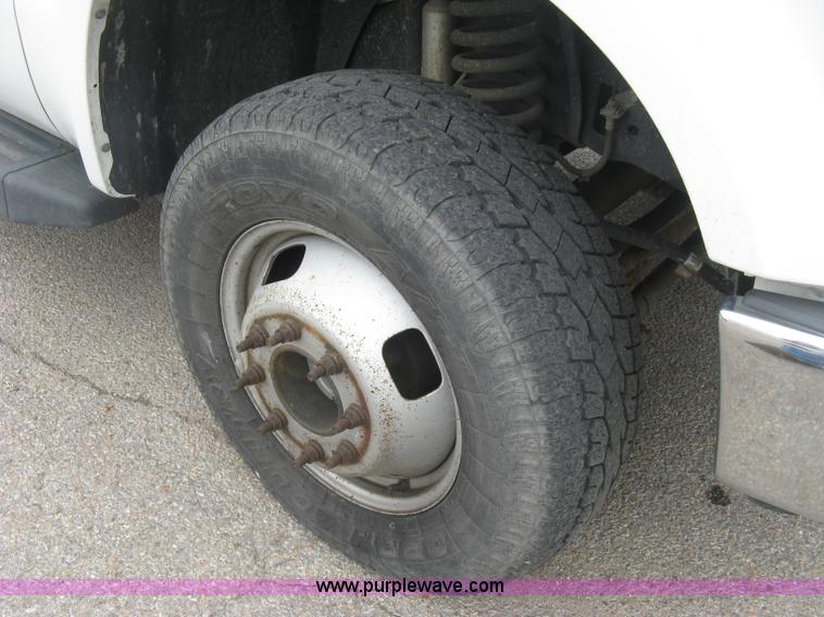 image for item H8646 2008 Ford F350 Super Duty XL Crew Cab flatbed truck