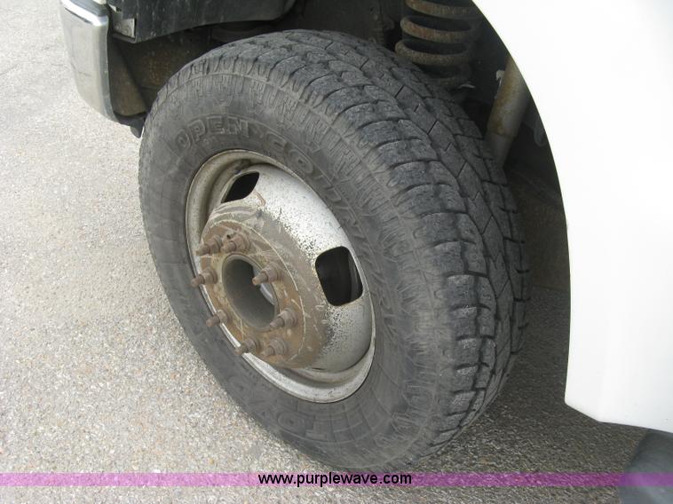 image for item H8646 2008 Ford F350 Super Duty XL Crew Cab flatbed truck