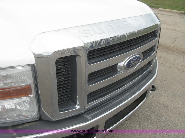 image for item H8646 2008 Ford F350 Super Duty XL Crew Cab flatbed truck