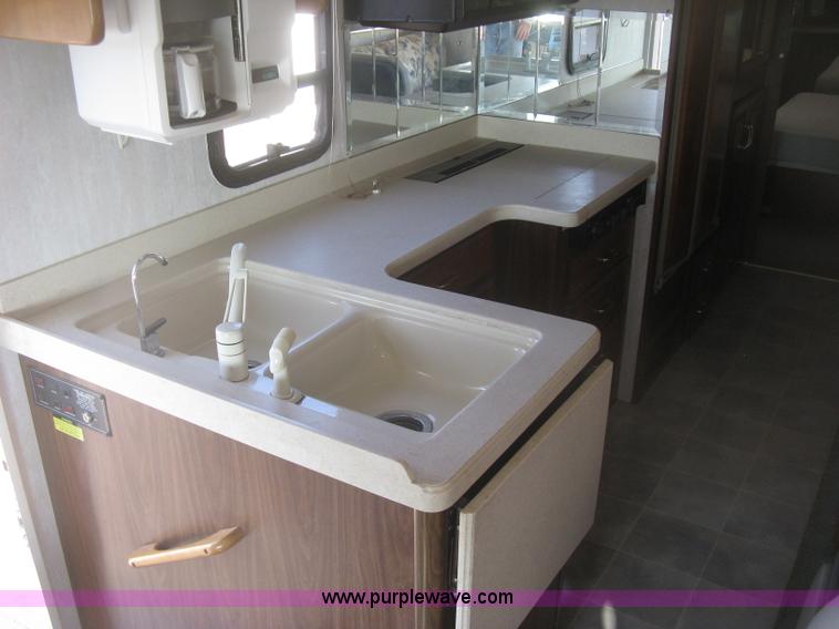 image for item K2972 1999 Ford 6350 Tropi-Cal RV