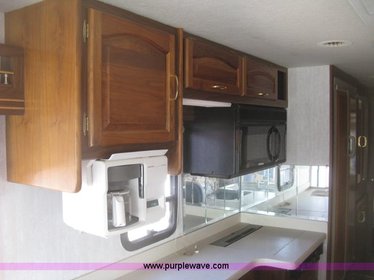 image for item K2972 1999 Ford 6350 Tropi-Cal RV