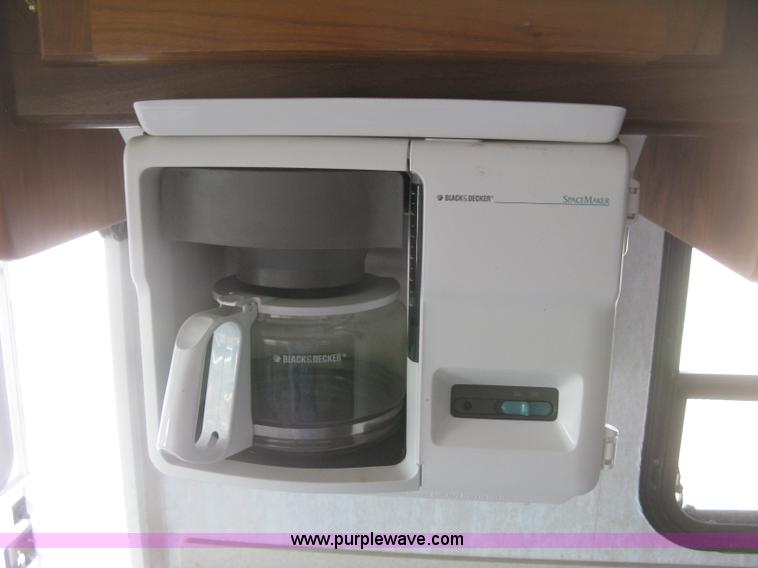 image for item K2972 1999 Ford 6350 Tropi-Cal RV