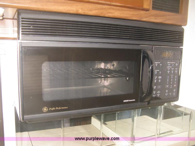 image for item K2972 1999 Ford 6350 Tropi-Cal RV