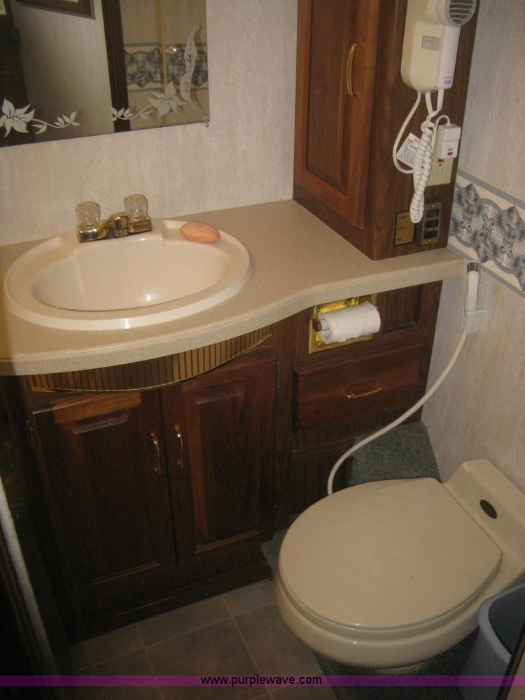 image for item K2972 1999 Ford 6350 Tropi-Cal RV