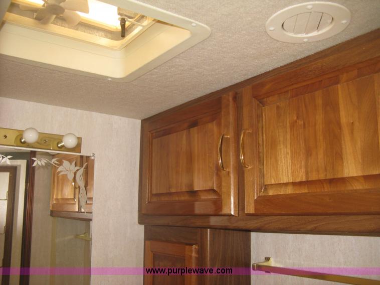 image for item K2972 1999 Ford 6350 Tropi-Cal RV