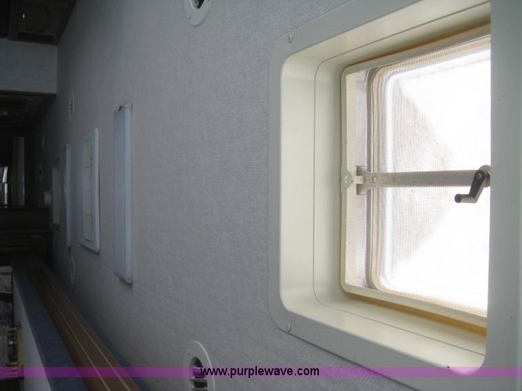 image for item K2972 1999 Ford 6350 Tropi-Cal RV