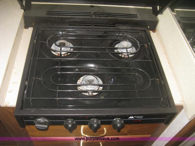 image for item K2972 1999 Ford 6350 Tropi-Cal RV