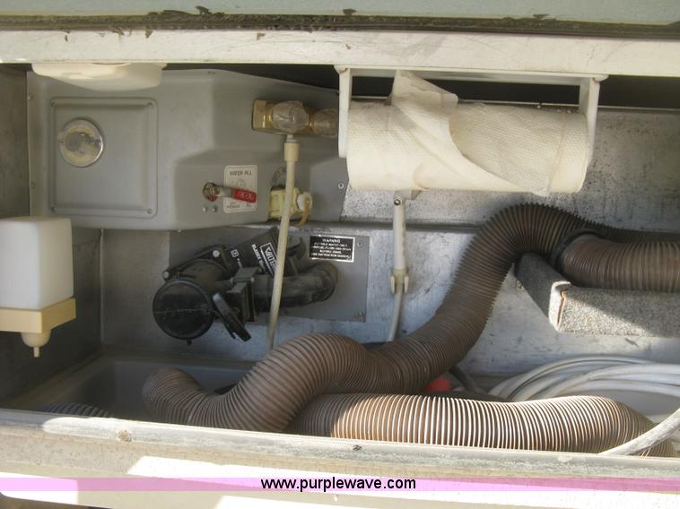 image for item K2972 1999 Ford 6350 Tropi-Cal RV