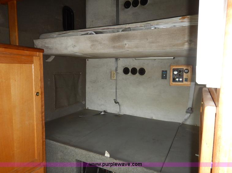 image for item K7392 2000 Freightliner FL70 semi truck