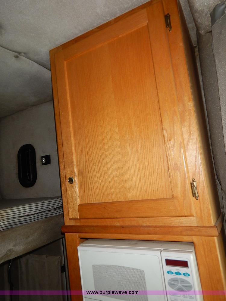 image for item K7392 2000 Freightliner FL70 semi truck