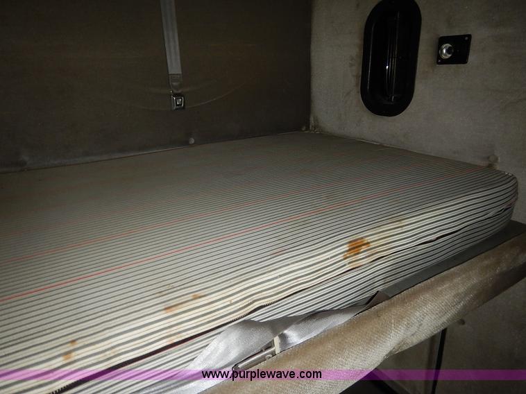 image for item K7392 2000 Freightliner FL70 semi truck