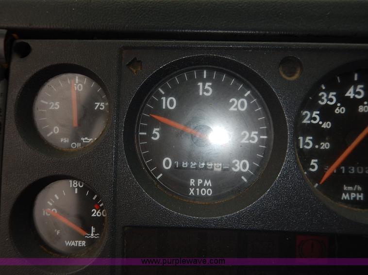 image for item K7392 2000 Freightliner FL70 semi truck