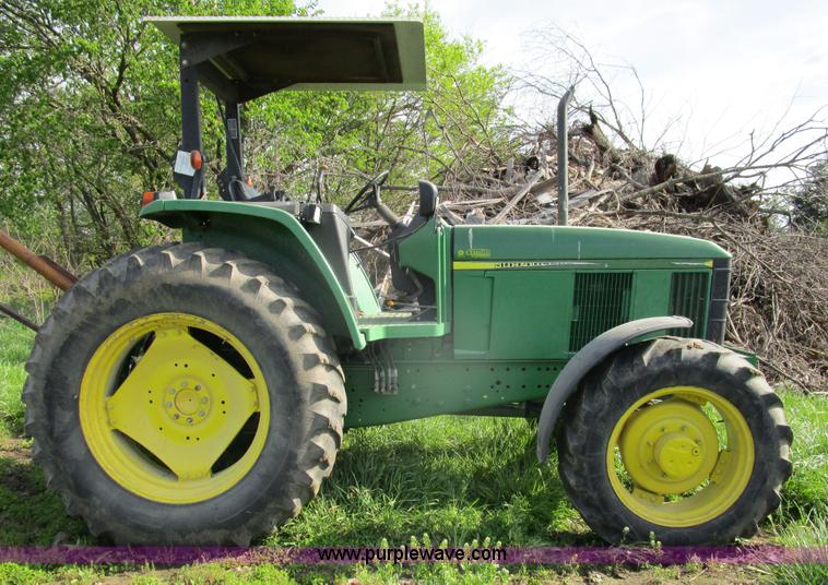 image for item D2426 2000 John Deere 6605 tractor