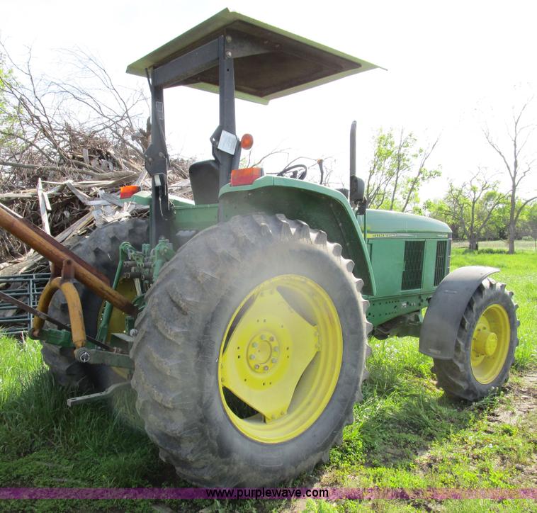 image for item D2426 2000 John Deere 6605 tractor