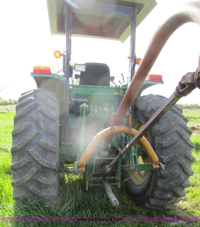 image for item D2426 2000 John Deere 6605 tractor