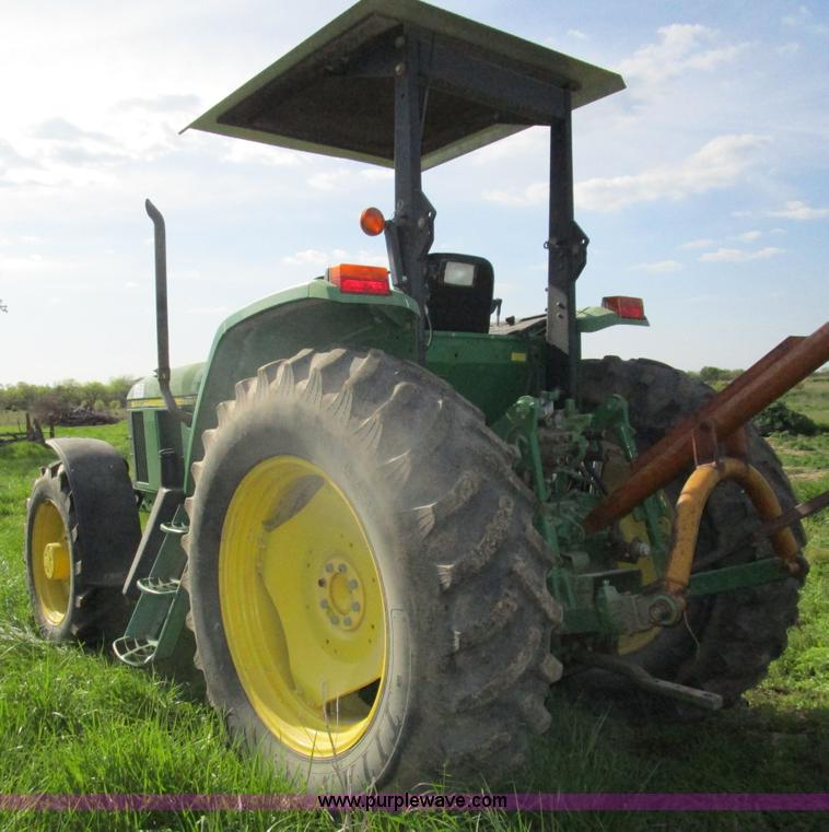 image for item D2426 2000 John Deere 6605 tractor