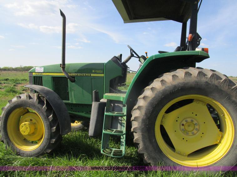 image for item D2426 2000 John Deere 6605 tractor