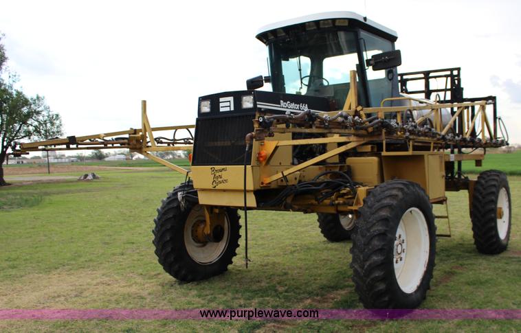 image for item F7693 1993 Ag-Chem RoGator 664 self-propelled sprayer