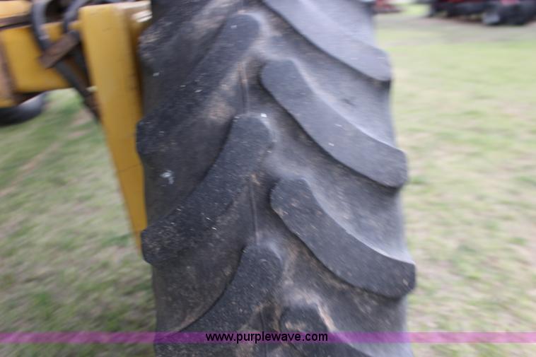 image for item F7693 1993 Ag-Chem RoGator 664 self-propelled sprayer