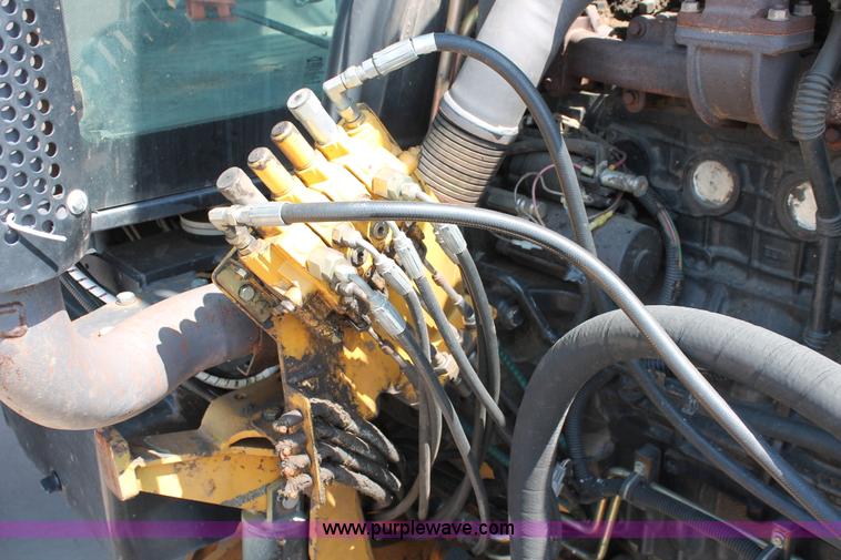 image for item H5821 2005 New Holland TS115A MFWD tractor