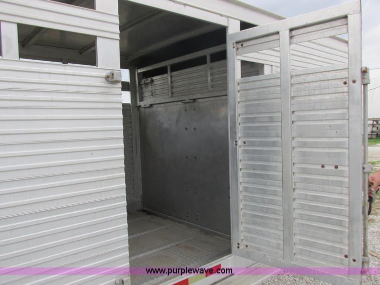 image for item K2101 1999 Barrett gooseneck livestock trailer