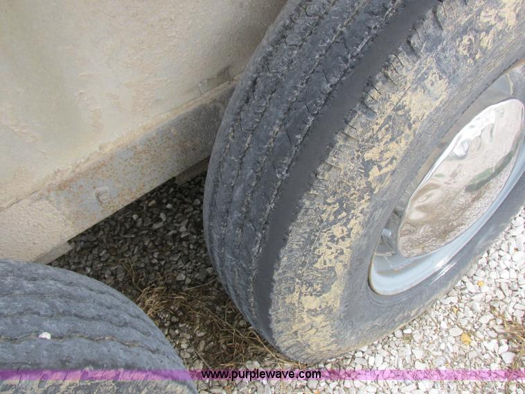 image for item K2101 1999 Barrett gooseneck livestock trailer