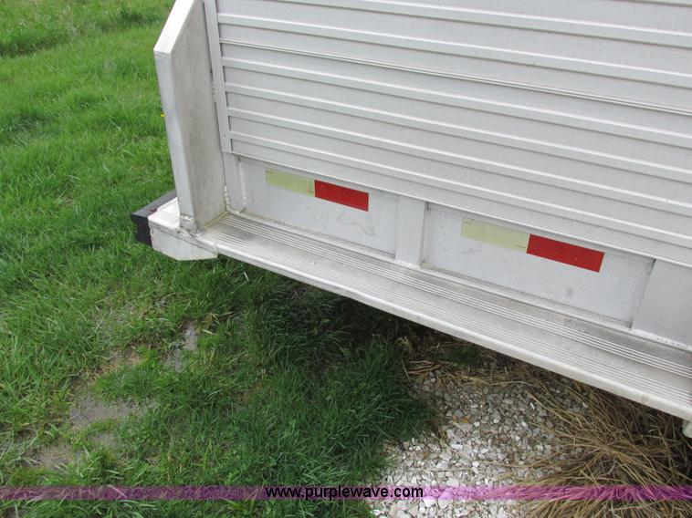 image for item K2101 1999 Barrett gooseneck livestock trailer