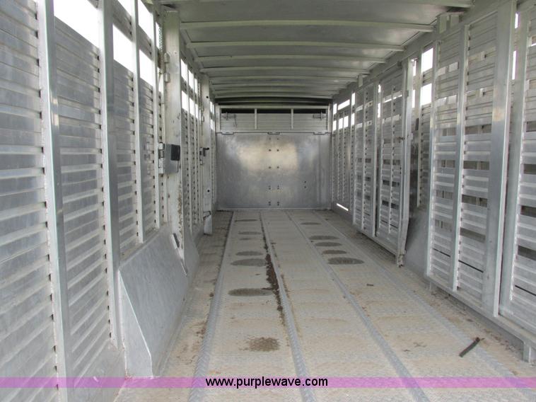 image for item K2101 1999 Barrett gooseneck livestock trailer