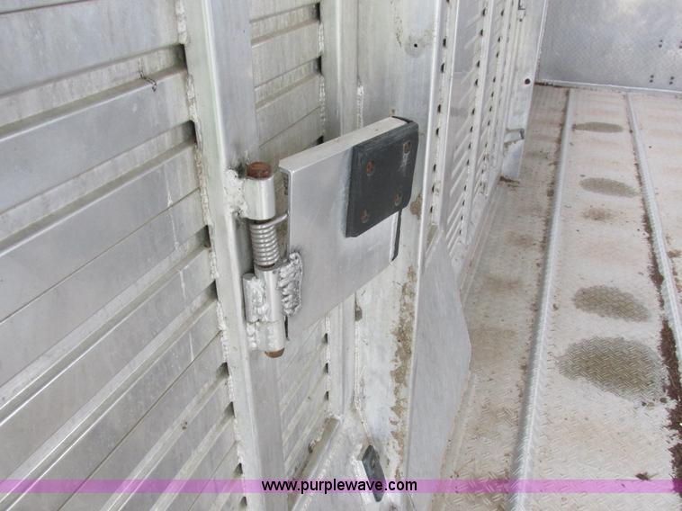 image for item K2101 1999 Barrett gooseneck livestock trailer