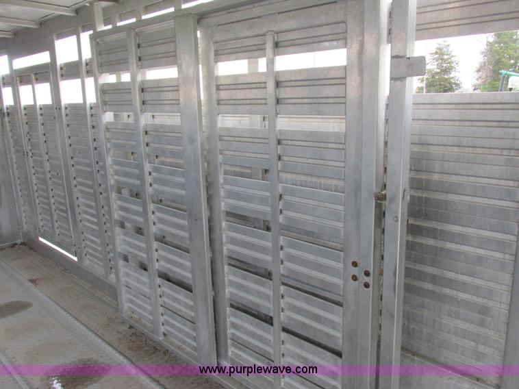 image for item K2101 1999 Barrett gooseneck livestock trailer