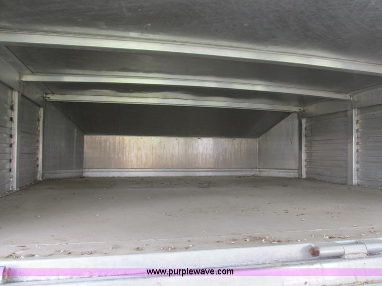 image for item K2101 1999 Barrett gooseneck livestock trailer