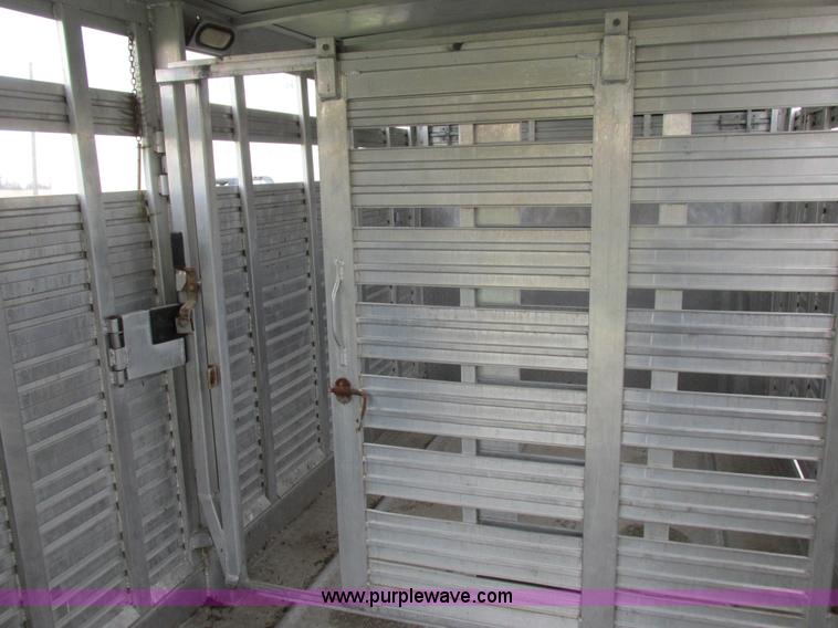 image for item K2101 1999 Barrett gooseneck livestock trailer