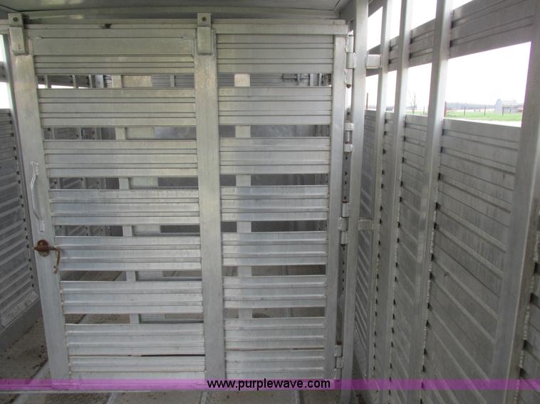 image for item K2101 1999 Barrett gooseneck livestock trailer