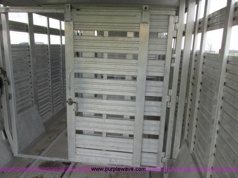 image for item K2101 1999 Barrett gooseneck livestock trailer