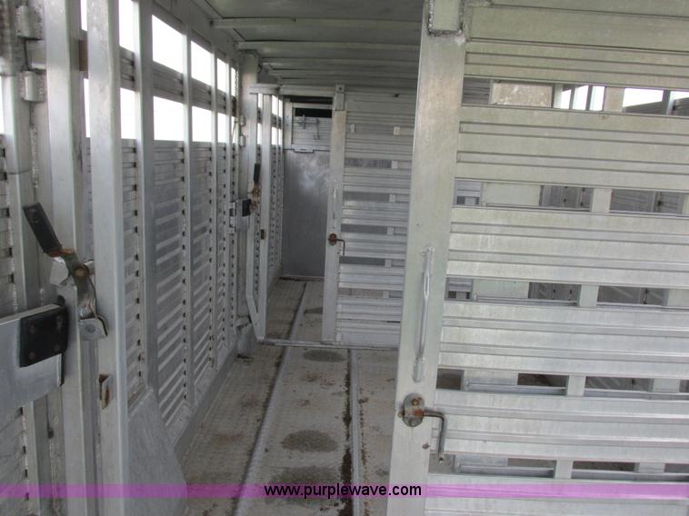 image for item K2101 1999 Barrett gooseneck livestock trailer