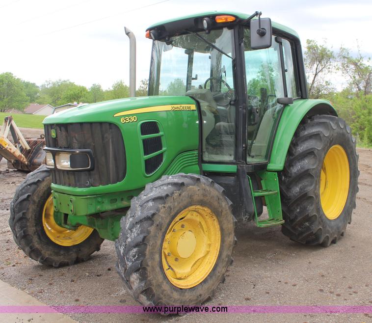 image for item K6868 2010 John Deere 6330 MFWD tractor