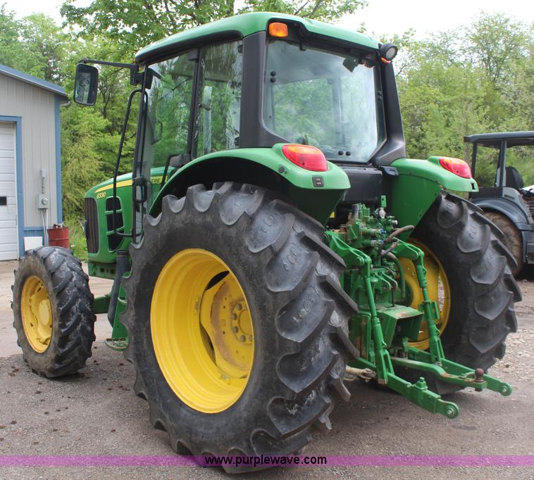 image for item K6868 2010 John Deere 6330 MFWD tractor