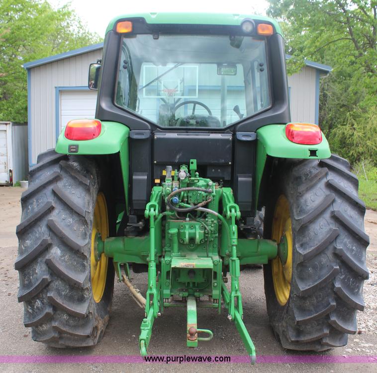 image for item K6868 2010 John Deere 6330 MFWD tractor