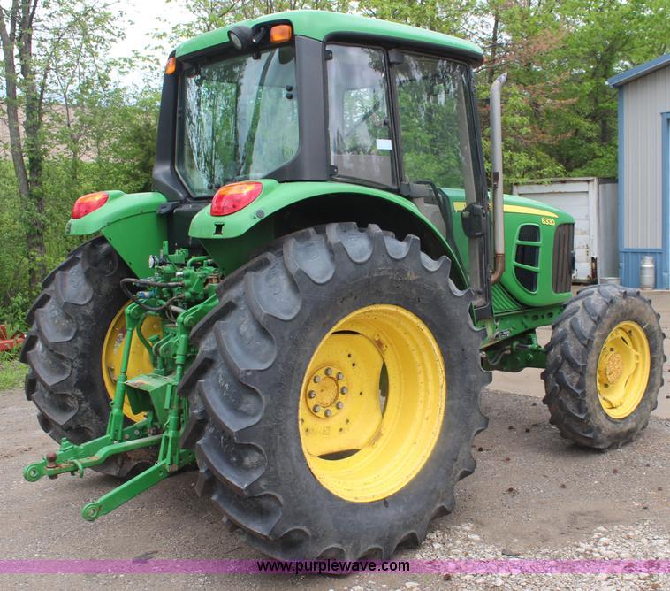 image for item K6868 2010 John Deere 6330 MFWD tractor
