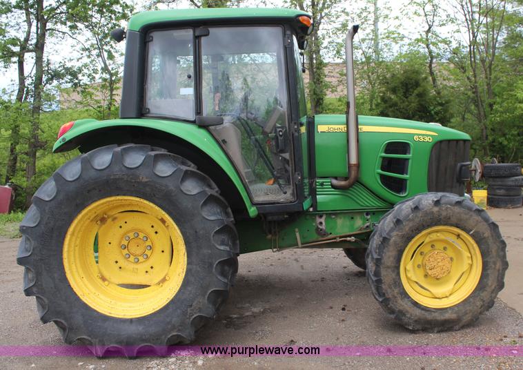 image for item K6868 2010 John Deere 6330 MFWD tractor