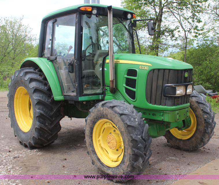 image for item K6868 2010 John Deere 6330 MFWD tractor