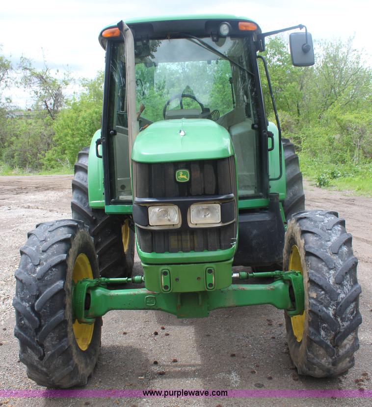 image for item K6868 2010 John Deere 6330 MFWD tractor
