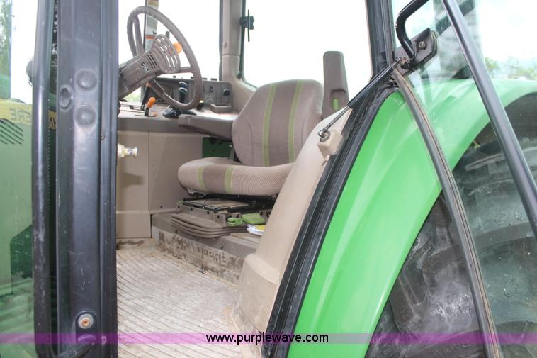 image for item K6868 2010 John Deere 6330 MFWD tractor
