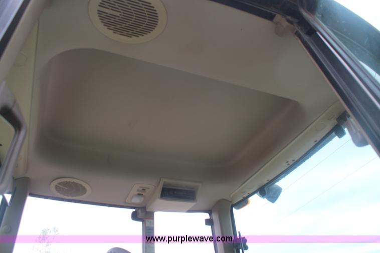 image for item K6868 2010 John Deere 6330 MFWD tractor