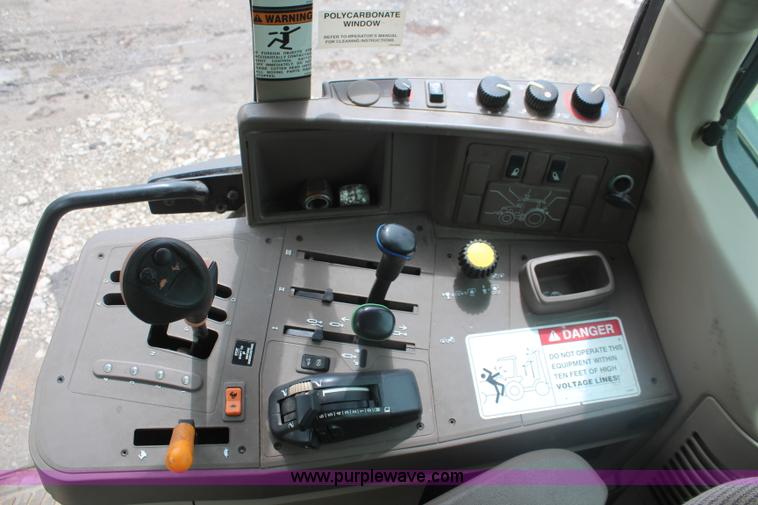 image for item K6868 2010 John Deere 6330 MFWD tractor