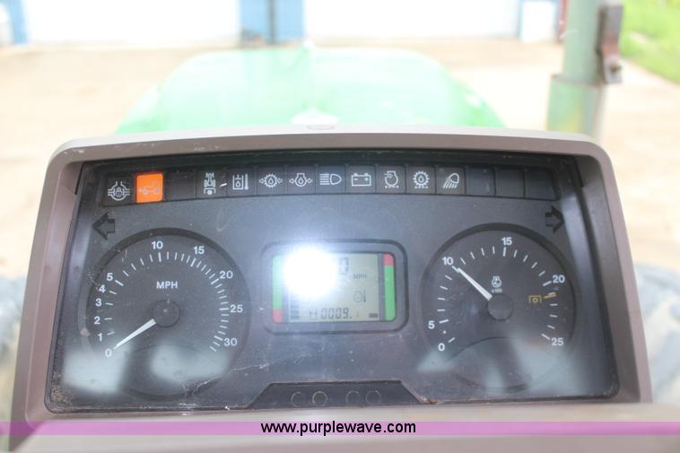 image for item K6868 2010 John Deere 6330 MFWD tractor