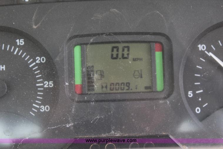 image for item K6868 2010 John Deere 6330 MFWD tractor